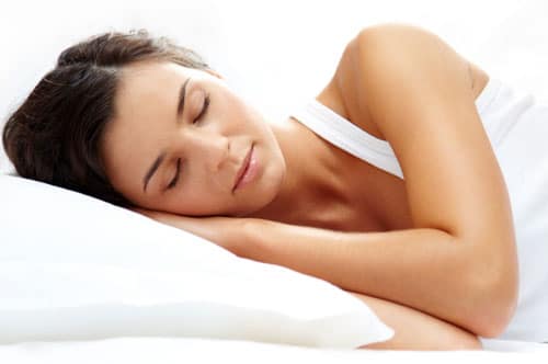 Woman Sleeping and Enjoying the Sedation Dentistry Benefits