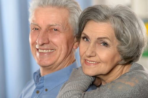 comparing dentures vs implants