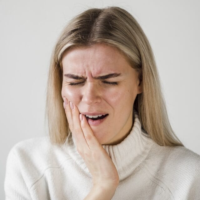 symptoms of tmj